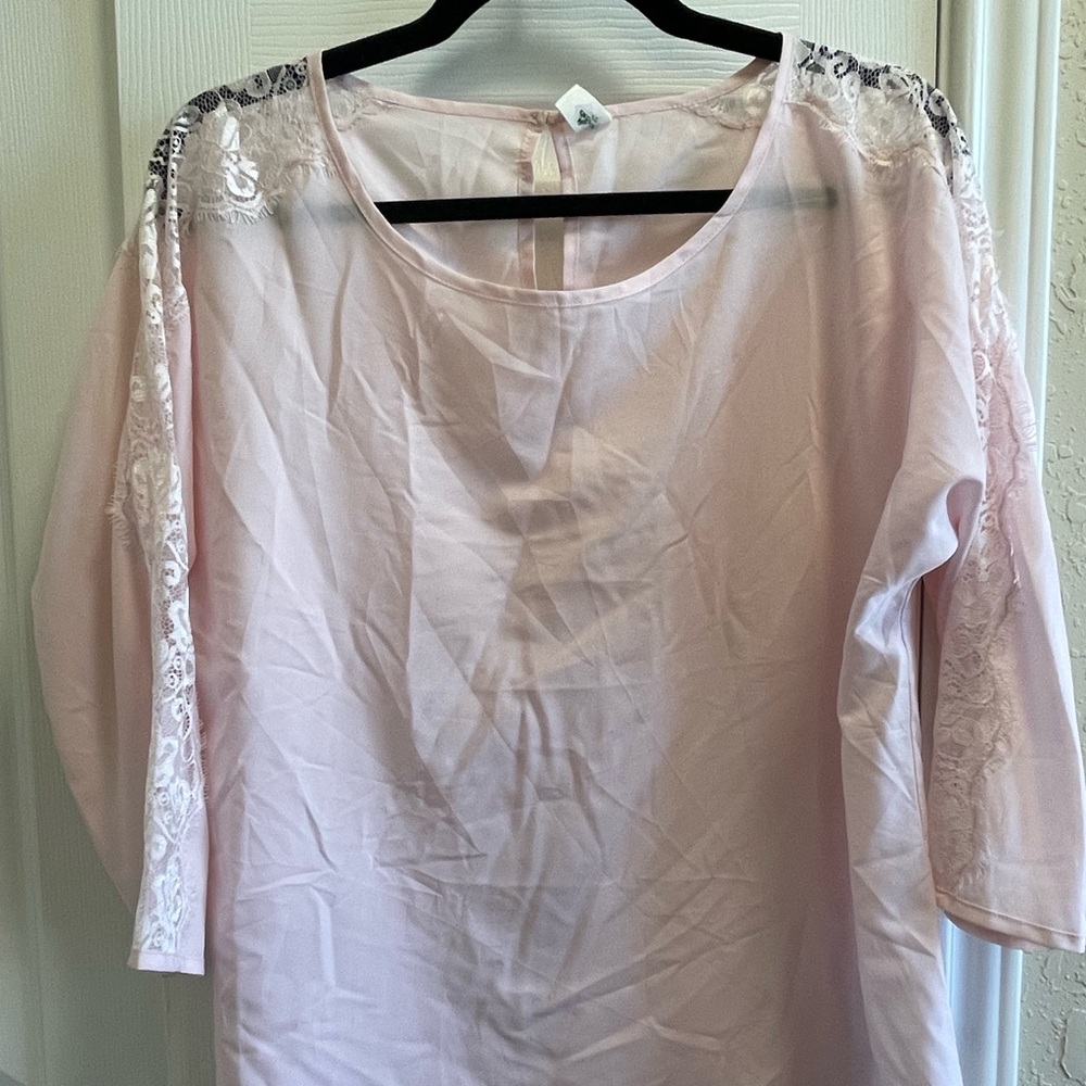 Pastel pink with lace design on arms. Sz M-old navy